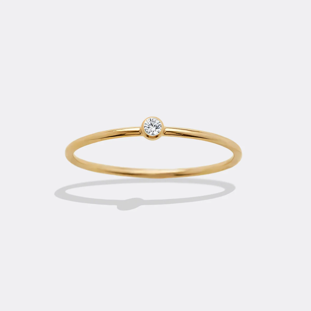 Minimalist Bezel-Set April Birthstone Stacking Band - Image 4