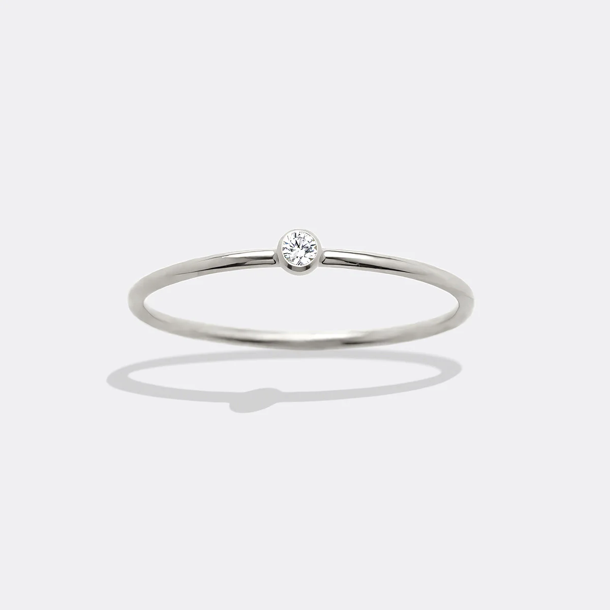 Minimalist Bezel-Set April Birthstone Stacking Band - Image 8